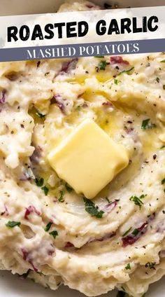 mashed potatoes with butter and parsley in a white bowl