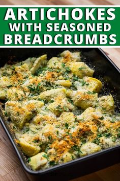 artichokes with seasoned breadcrumbs in a pan on a wooden table