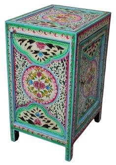 an ornately painted wooden box with wheels