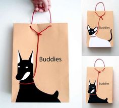 three bags with black and white dogs on them, one has a red string attached to it