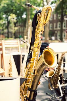 a close up of a saxophone on a street