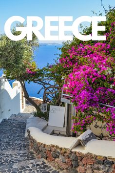 an image of the greek island with flowers and trees on it's side, as well as text overlay that reads greece