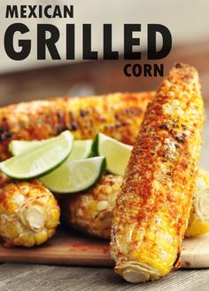 mexican grilled corn on the cob with lime wedges