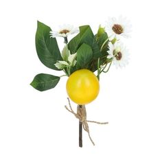 a yellow vase filled with white flowers next to a green leafy plant and an orange