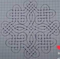 an intricate design is shown in the middle of a graphing paper with lines and dots