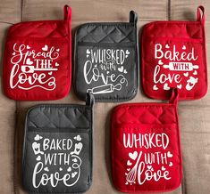 four oven mitts that say baked with love, baked with love and baked with love