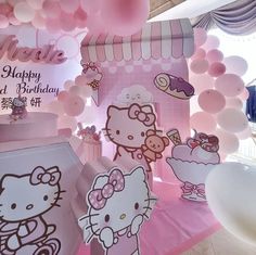 a hello kitty themed birthday party with balloons