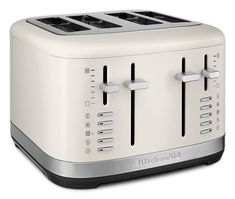 an image of a toaster that is white and black with four different knobs