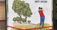 a handmade birthday card with a golf player