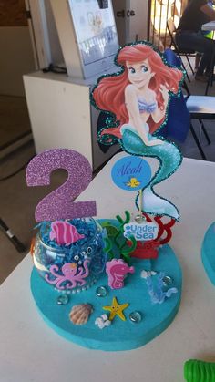 there is a birthday cake that looks like the little mermaid