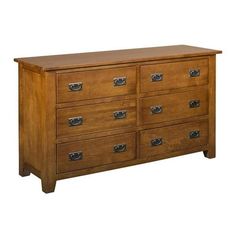 a large wooden dresser with many drawers