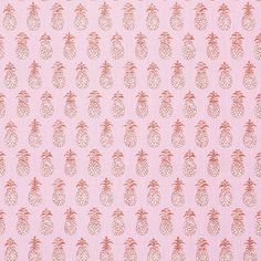 a pink background with orange pineapples on it