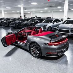 a car showroom filled with lots of cars