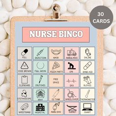 a clipboard with the words nurse bingo written on it next to some white rocks