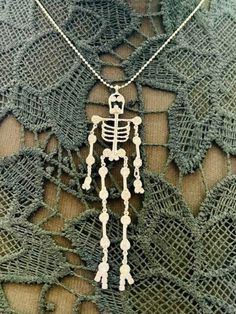 Just in time for Halloween! Here comes our Crystal Skeleton Guy!  He's absolutely adorable! As you wear him, he does a little bony dance as all his arms and legs move with each of your steps. He has matching earrings and a matching pin too! Please see our other listings. The necklace is included and measures 15 inches (with a 3-inch extender). Crystal Skeleton, Skeleton Necklace, Here Comes, Just In Time, Matching Earrings, Pendant Necklaces, Skeleton, Necklace Etsy, Jewelry Necklace Pendant