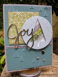 a card with the word joy on it