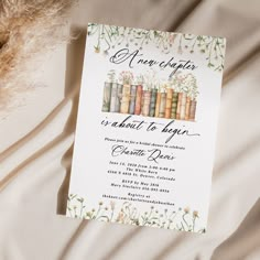 a book themed baby shower is displayed on a bed