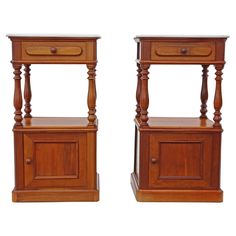 two wooden nightstands side by side on white background