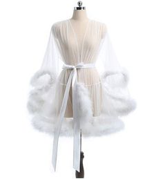 Sexy tulle robe with flirty marabou fur edge. Perfect for any special occasion such as prom, honey moon, Cocktail, Birthday, Photo Shoot, Masquerade Dancing Party, Anniversary, Engagement, Pageant, and more. Tulle, Fur, Satin Sash Length approx 34 inches Size S - suitable for size 0-6 Size M - suitable for size 8-14 Size L - suitable for size 16 - 20 Due to nature of the fur edge, some fur may fall off, however it will not affect the look. Turn around time around 1-2 weeks. Fancy Robes, Lingerie Party, Satin Sash, Ball Gowns Evening, Costumes For Women, Dress Backs, Perfect Dress, Dress Making, Dresses Online