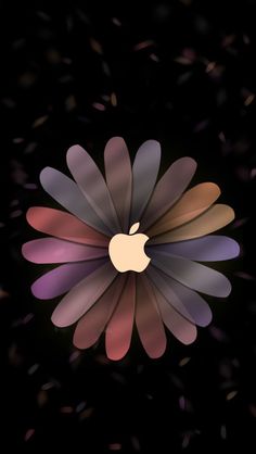 an apple logo is shown in the middle of a purple and blue flower on a black background