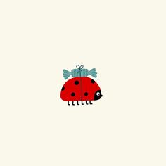 a ladybug with a bow on its head