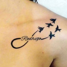 the back of a woman's shoulder with birds flying around it that says radigo