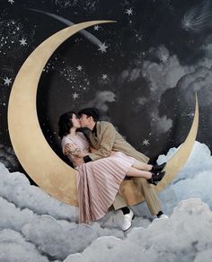 a man and woman kissing on the moon with stars in the sky behind them,