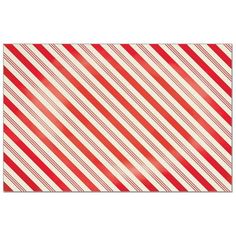 a red and white striped paper with diagonal stripes on the bottom, as well as an image