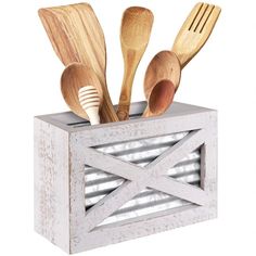 wooden utensils and spoons in a container