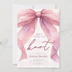 a pink and white card with the words, she's tying the knot on it