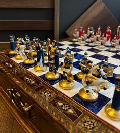 a chess board with some figurines on it