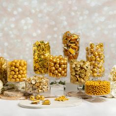 a table topped with lots of different types of candies