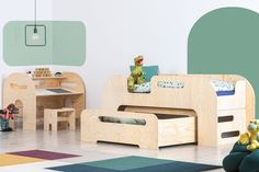 a child's bedroom with wooden furniture and toys on the floor in front of it