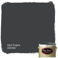 the dark gray paint is being used to create an image