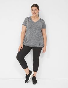 Available in Plus Size. A wicking LIVI Active tee with flattering seams. V-neck. Short sleeves.

With wicking technology: supportive stretch and fade-resistant, moisture-wicking and quick-drying fabric.                                                      Item Number #352651Length: 30"Imported Plus Size Activewear