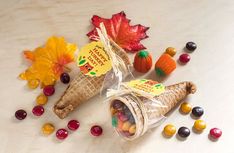 an ice cream cone filled with candy and candies