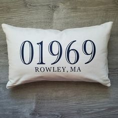 a white pillow with the words'0199 rovely, ma'printed on it