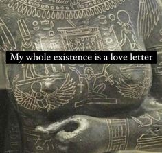 an ancient statue with the words, my whole existence is a love letter