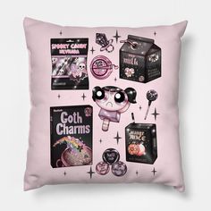 a pink pillow with various items on it and the words goth charms written in black