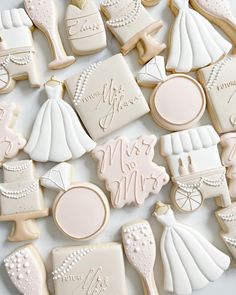 wedding cookies are arranged on a table