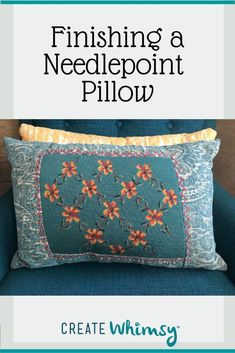 a blue chair with a pillow on it and the title finishing a needlepoint pillow