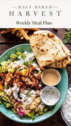 an image of a plate of food with pita bread