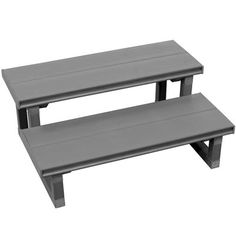 two gray benches sitting next to each other on a white background and one is empty