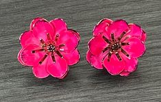 Beautiful vintage estate clip on earrings.  Pink enamel flowers, I believe is from the 1960's.  I don't have much information in them.  One looks slightly smaller than the other (see pics).  Buyer can try to adjust the petals if they choose. Recently attended the estate sale of a 98 year old women.  I was lucky enough to find some beautiful pieces that I will be offering in my shop.  This is one of them and I will be adding more beautiful pieces of jewelry from the same estate , please take a look.  Thank you! We are a Mom and Pop operation! We sell new & old, useful and odd and everything in-between. We keep our starting bids low and our descriptions fair and accurate. We aren't a store or website. We love finding and selling items that people can enjoy or repurpose.   Free Insured Shippi Anniversary Flower Clip-on Earrings, Anniversary Clip-on Flower Earrings, Vintage Clip-on Flower Earrings, Vintage Pink Earrings For Spring, Pink Vintage Earrings For Spring, Vintage Flower-shaped Clip-on Earrings, Vintage Flower Shaped Clip-on Earrings, Vintage Pink Flower-shaped Earrings, Vintage Flower Shaped Earrings For Anniversary