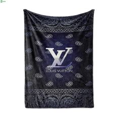 the louis vuitton bandana is hanging on a wall with an image of a v