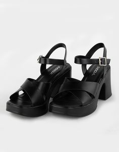 Soda Touch Platform Heel Sandals. Crisscross Toe Straps. Ankle Straps With Silver Toned Buckle. Round Toe. Platform Sandal. Block Heel. Synthetic Leather Uppers. Cushioned Footbed. Approx. Heel Height : 4''. Imported. Casual T-strap Sandals With Platform, 2000s Sandals, Soda Platform Sandals, Spring Ankle Strap T-strap Sandals With Platform, Soda Sandals, Casual T-strap Platform Sandals With Open Heel, Summer Platform T-strap Sandals With Open Heel, Soda Shoes, Black Platform Sandals