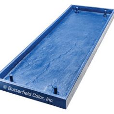 a blue tray that is sitting on the ground