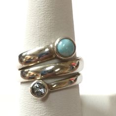 This Sterling Silver Wrap Style Ring Has A Band Of Sterling Silver Wrapped Around 3 Times With Larimar On One Tip And Faceted Blue Topaz On The Other. As With All My Listings, This Is New Never Worn. Thank You For Your Interest. Blue Topaz Natural Stone Ring, Blue Topaz Ring With Natural Stones, Elegant Blue Larimar Rings, Elegant Blue Larimar Turquoise Ring, Elegant Silver Stackable Rings With Natural Stones, Elegant Silver Turquoise Ring With Birthstone, Silver Apatite Jewelry For Anniversary, Elegant Silver Turquoise Birthstone Ring, Stackable Blue Turquoise Ring In Sterling Silver