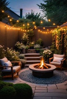 an outdoor fire pit surrounded by chairs and lights