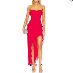 Turn Heads This Holiday Season With Amanda Uprichard's Anessa Gown In Kiss. This Strapless Red Dress Features A Hidden Back Zipper Closure, Elegant Ruffle Trim, A Stylish Hi-Low Hem, And Is Made From Georgette Fabric. Embrace The Festive Spirit In This Glamorous Gown. Item Runs True To Size 100% Polyester Dry Clean Only Fully Lined Hidden Back Zipper Closure Lightweight Georgette Fabric With Ruffle Trim And Hi-Low Hem Neckline To Shortest Hem Measures Approx 22.5" And To Longest Hem Approx 47.5" Strapless Red Dress, Manhattan Lifestyle, Amanda Uprichard Dress, Red Strapless Dress, Strapless Evening Dress, Luxe Clothing, Amanda Dress, Amanda Uprichard, Red Gowns